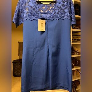 Blue lace dress tags on